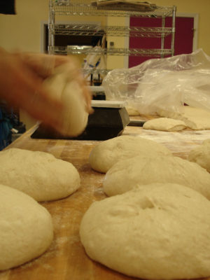 Rounding the Dough after Scaling the Loaves
